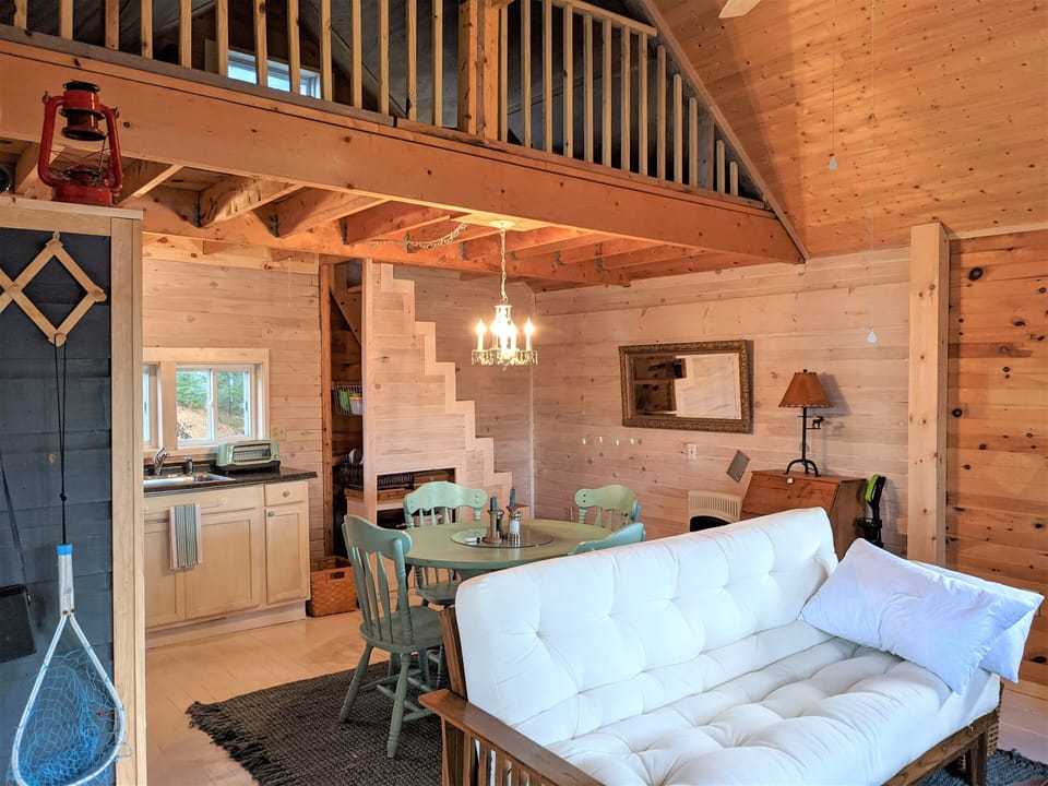 Entering "Cabin Beaver" Looking toward kitchen and stairway (steep) to loft.