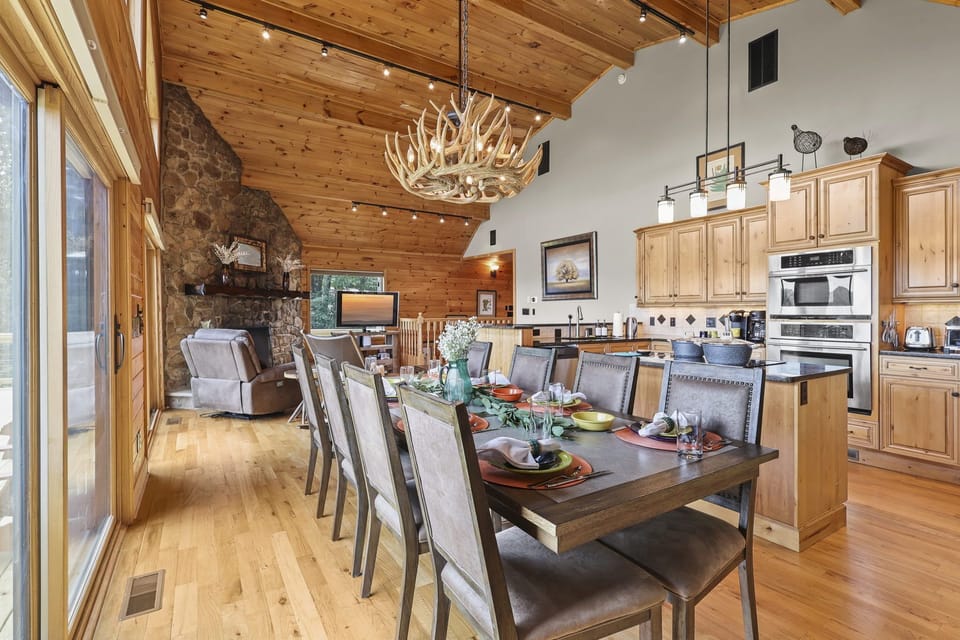 A large dining table that seats 8 guests comfortably.