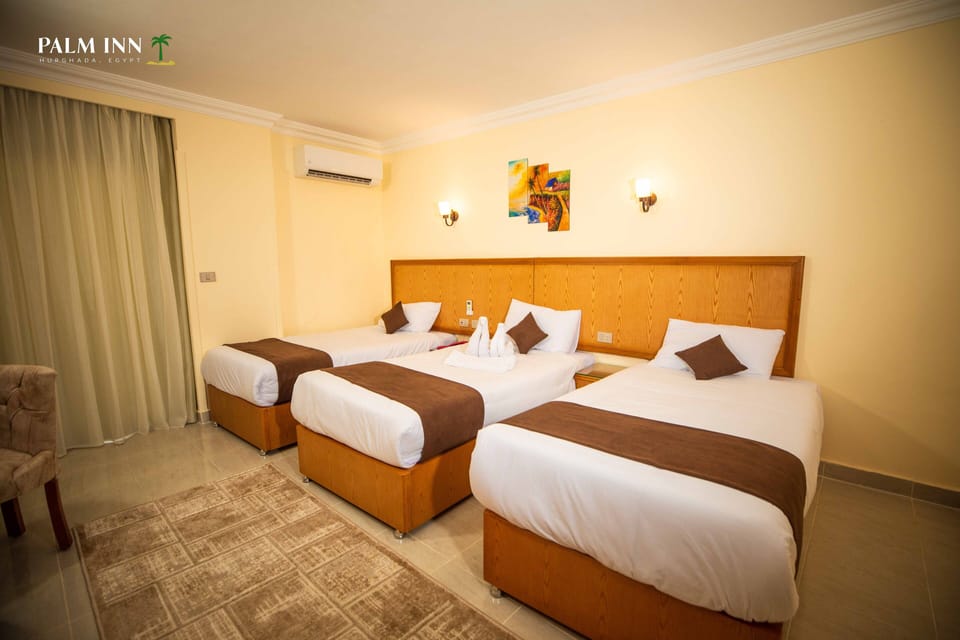 Standard Triple Room, 1 Bedroom | Minibar, desk, laptop workspace, iron/ironing board
