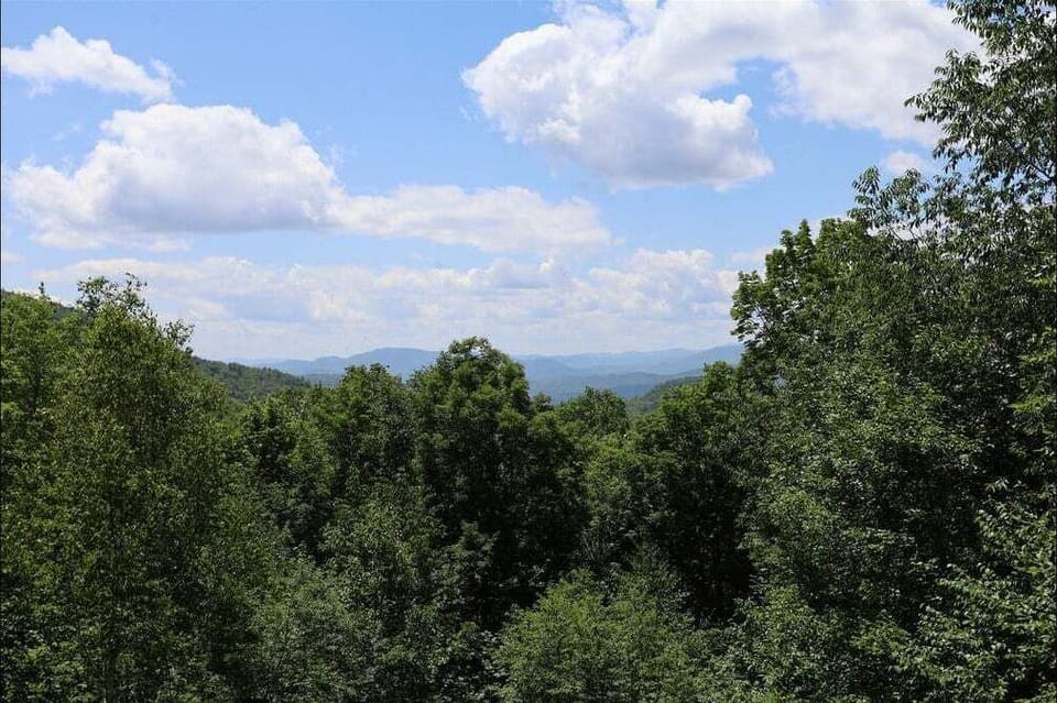 Beautiful Mountain Views from the Open Deck at This Private Waterville Estates Home