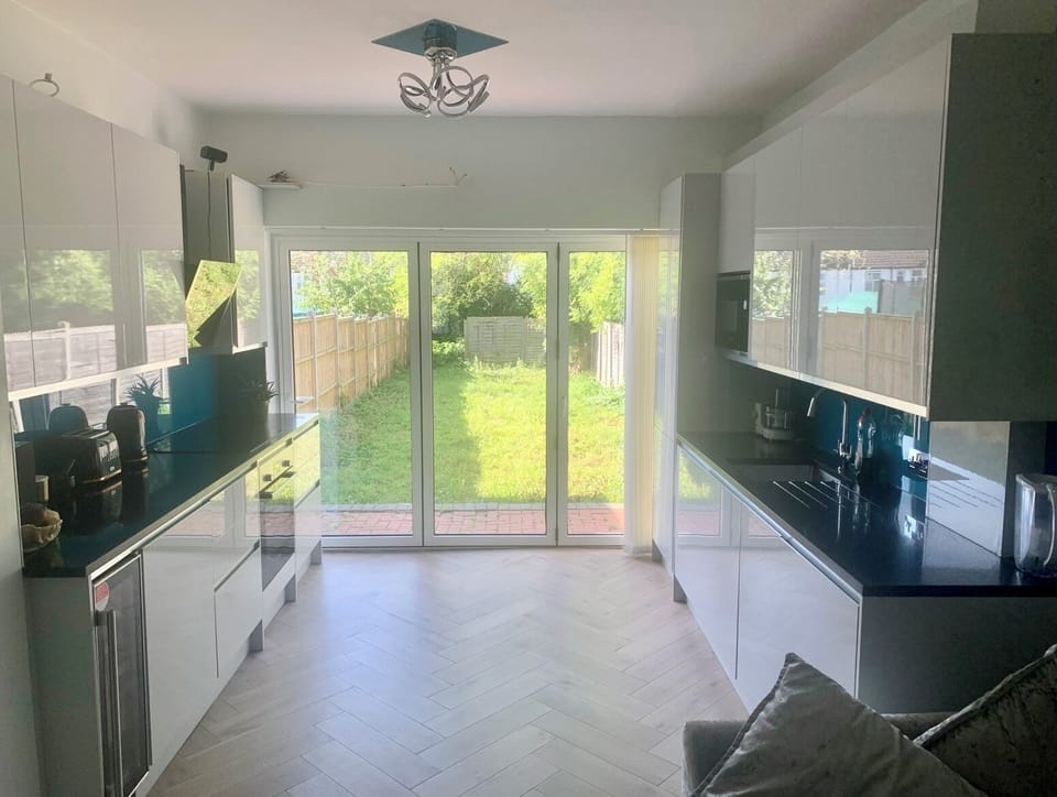 Exquisite kitchen, premium integrated appliances, dove grey unit, quartz worktop