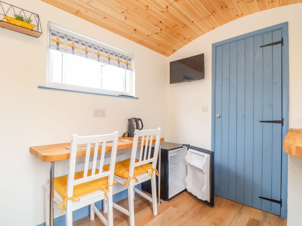 Fridge, electric kettle, toaster, cookware/dishes/utensils