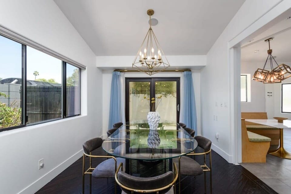 Seat 8 at the formal dinning area while additonal guest can sit at the breakfast table just off the side