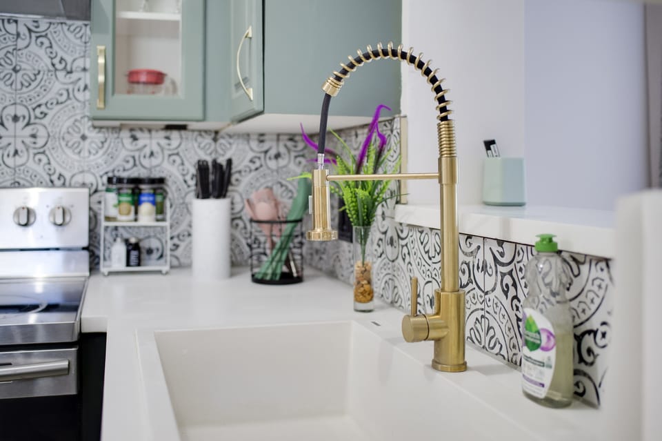 Gold kitchen sink fixture
