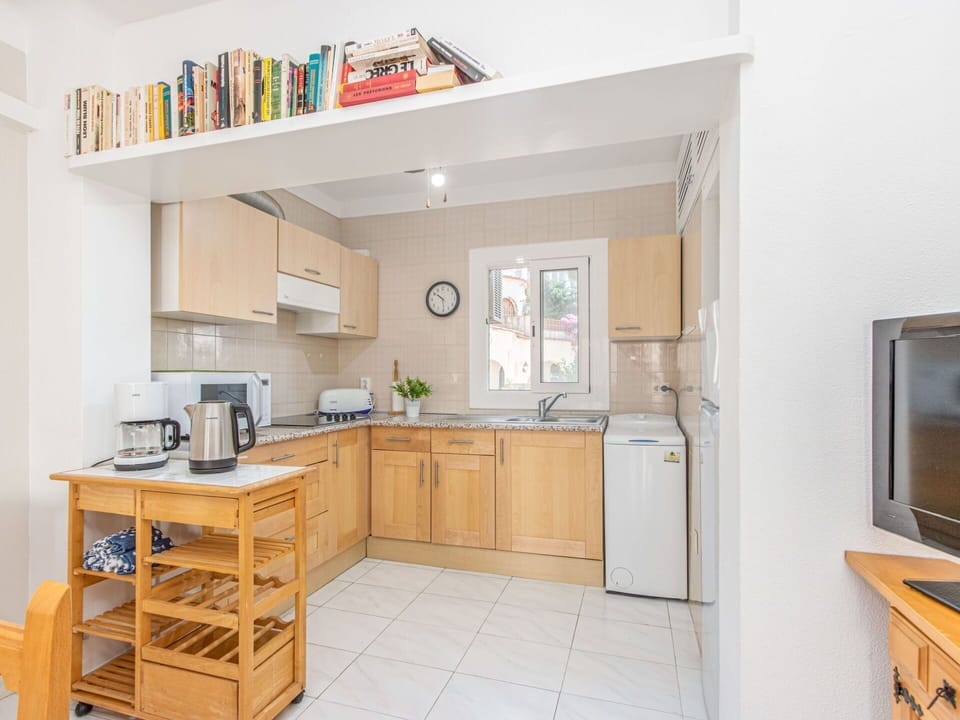 Cabinetry, Furniture, Building, Countertop, Drawer, Sink, Home Appliance, Kitchen Stove, Wood, Shelf