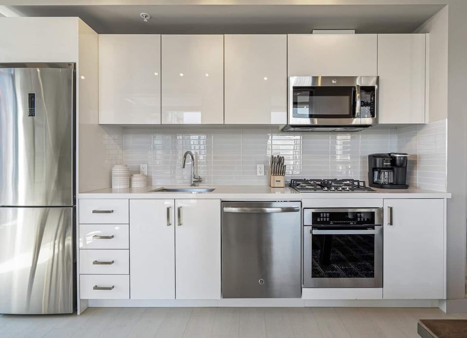 Full kitchen; complete with pots, pans, dinnerware, mixing bowls, bakeware, as more. Prepare meals for your group and enjoy seating for 6 around the dining table. 