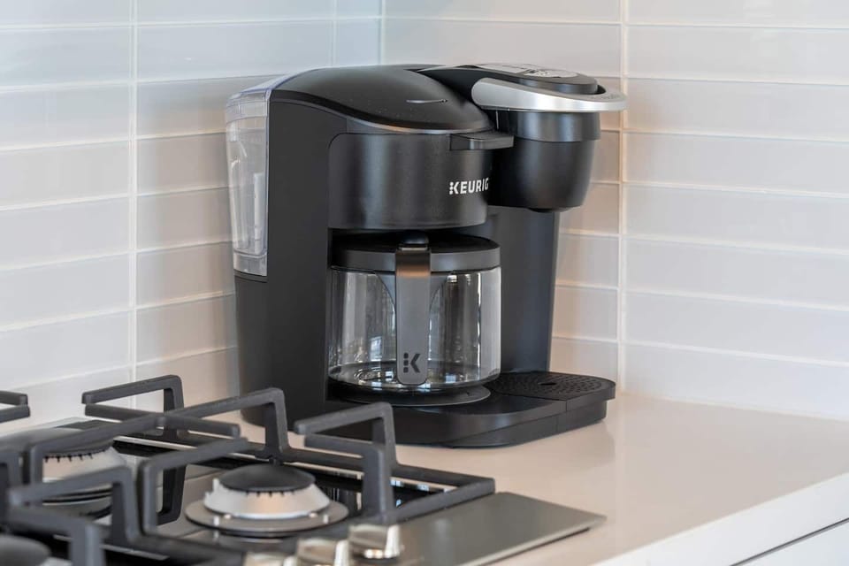 This home features several coffee options, including a pour-over setup (bring your favourite ground coffee), and a Nespresso machine.