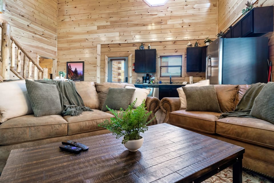 Relax in our open layout living area.  Family can spread out throughout the house for their own quiet time or come together to prep dinner and lounge around the living room.  Couch is also a sleeper sofa.