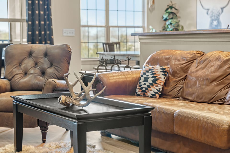 Feel at home in this cozy Living Room before exploring Table Rock Lake!