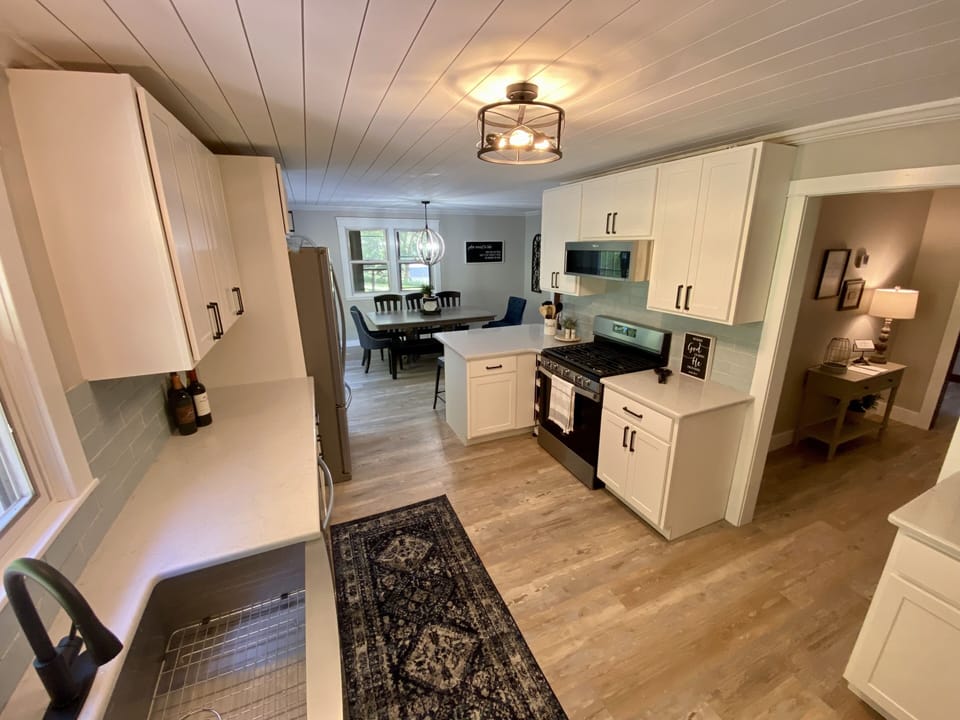 Fully renovated kitchen with brand new stainless appliances and gas range