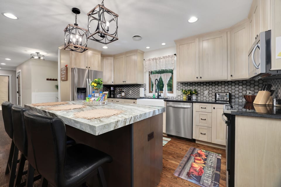 Gourmet kitchen with island.