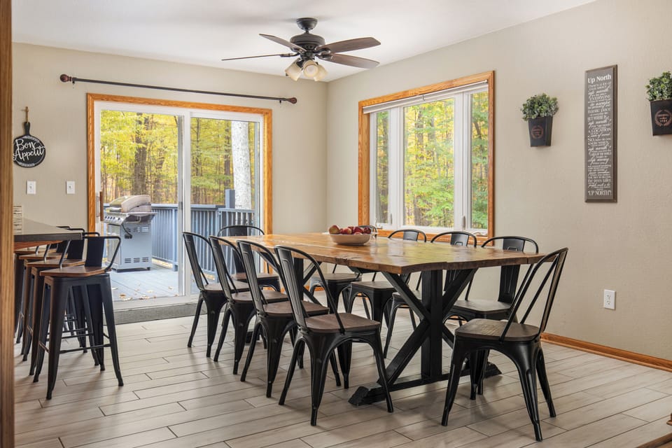 Dining room table with space for 10 and 4 bar stools as well. 