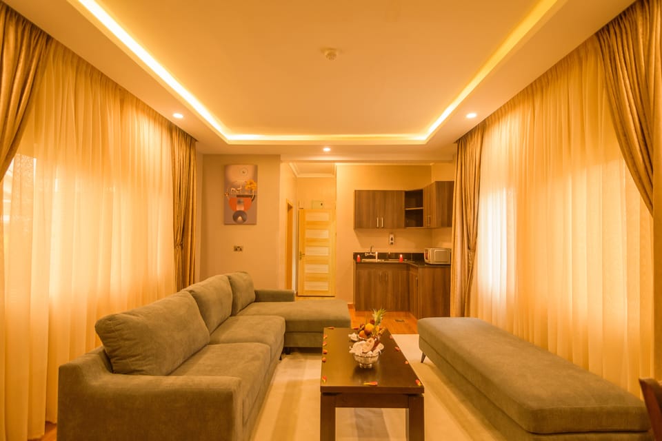 Executive Room, 1 King Bed | Living area | 43-inch Smart TV with satellite channels, TV