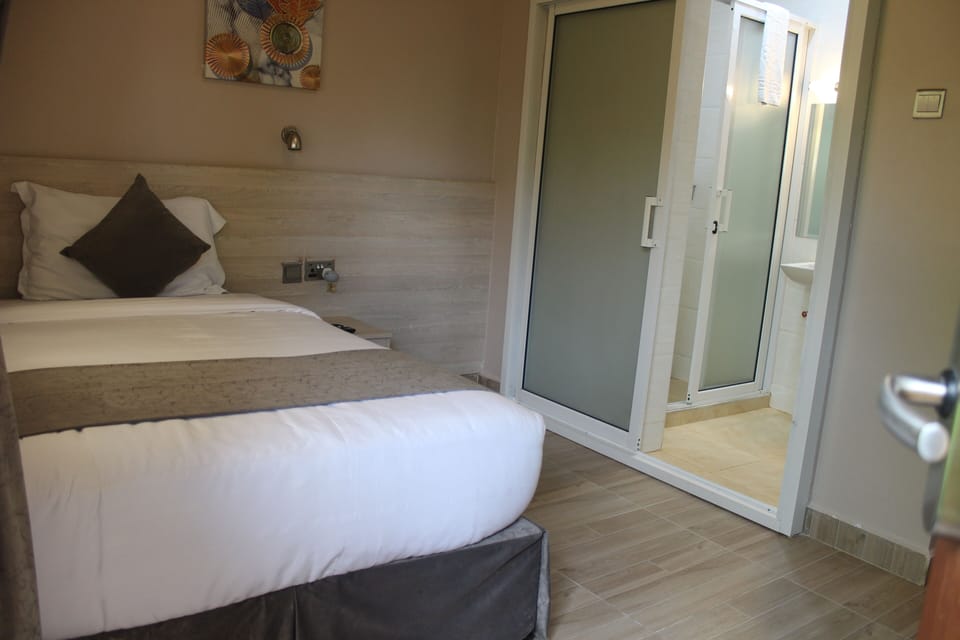 Basic Room | Premium bedding, pillowtop beds, individually decorated