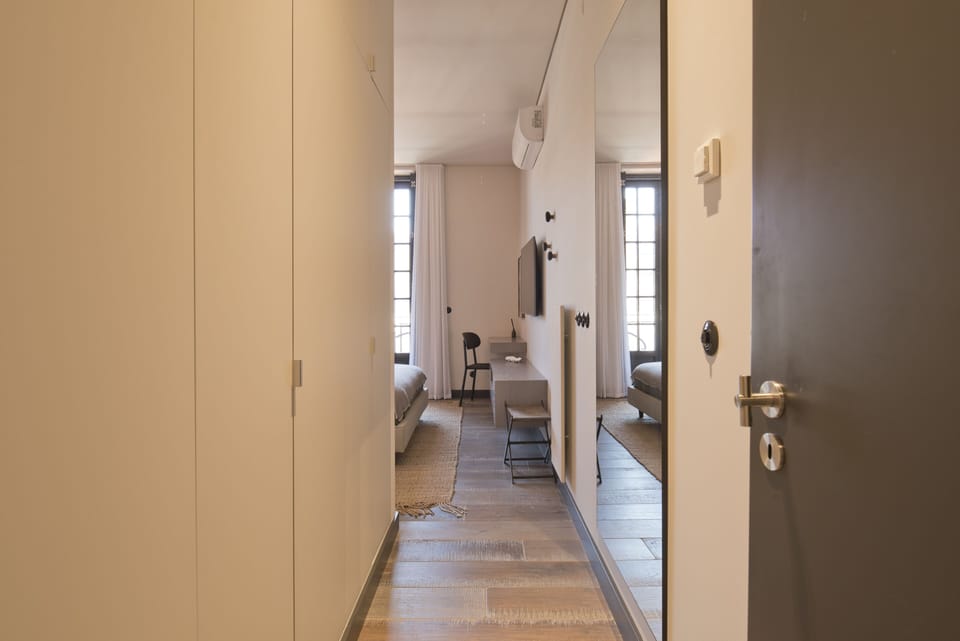 Main suite entrance with closets