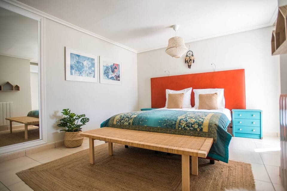 Spacious master bedroom of the guesthouse. All bedrooms have air conditioning.