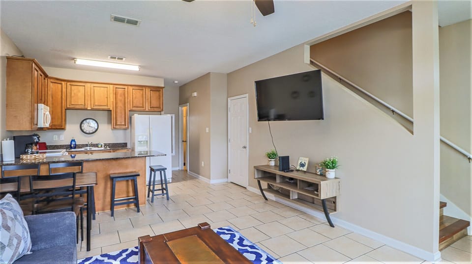 Open concept living room, dining, and kitchen! Perfect for socializing! 