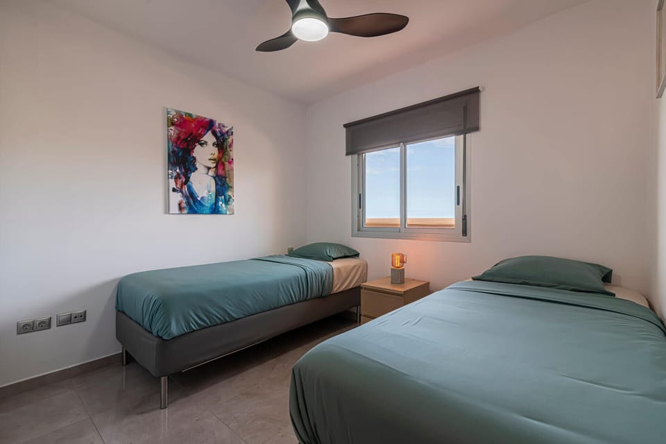 Sleep comfortably in this room with Zen decoration and very cozy beds.