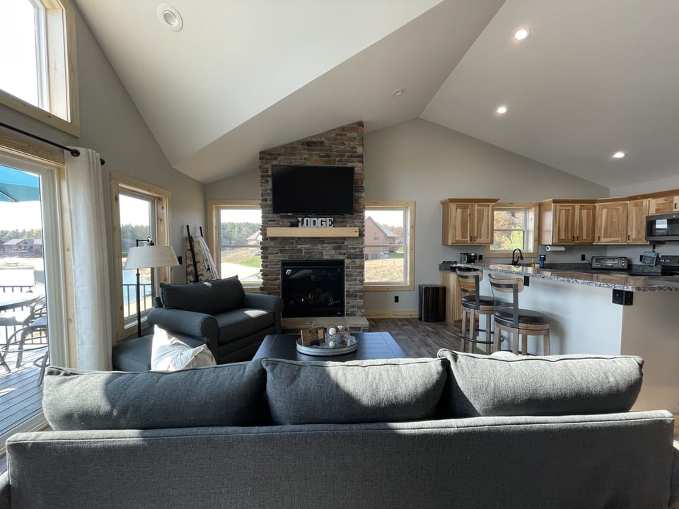 Gorgeous STONE fireplace! (Turned on with a flip of a switch!)