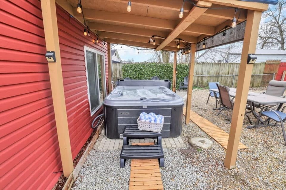 Private fenced in yard with hot tub