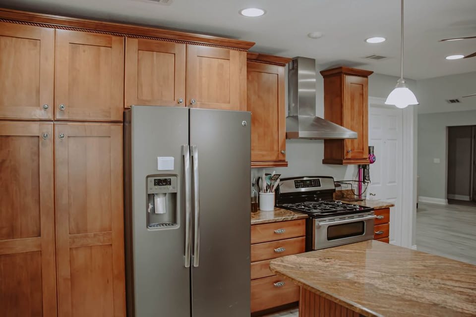 Full sized fridge, gas stove, and double oven make this a chef's dream. 