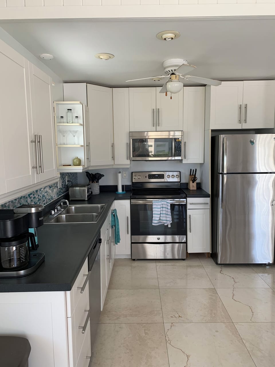 2nd Floor - fully equipped kitchen. Sliding patio doors lead out to balcony