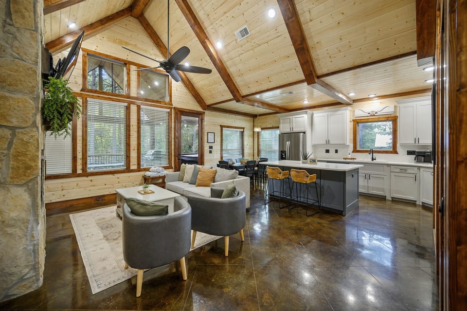 Cozing living room and fully stocked kitchen.