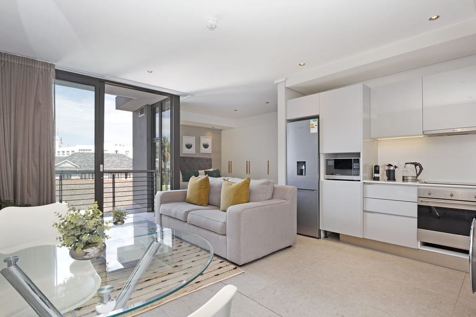 Exclusive Studio | Living area | 38-inch flat-screen TV with cable channels, TV, Netflix