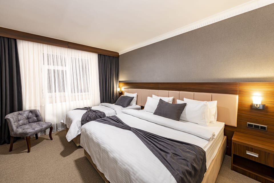 Premium bedding, minibar, in-room safe, laptop workspace