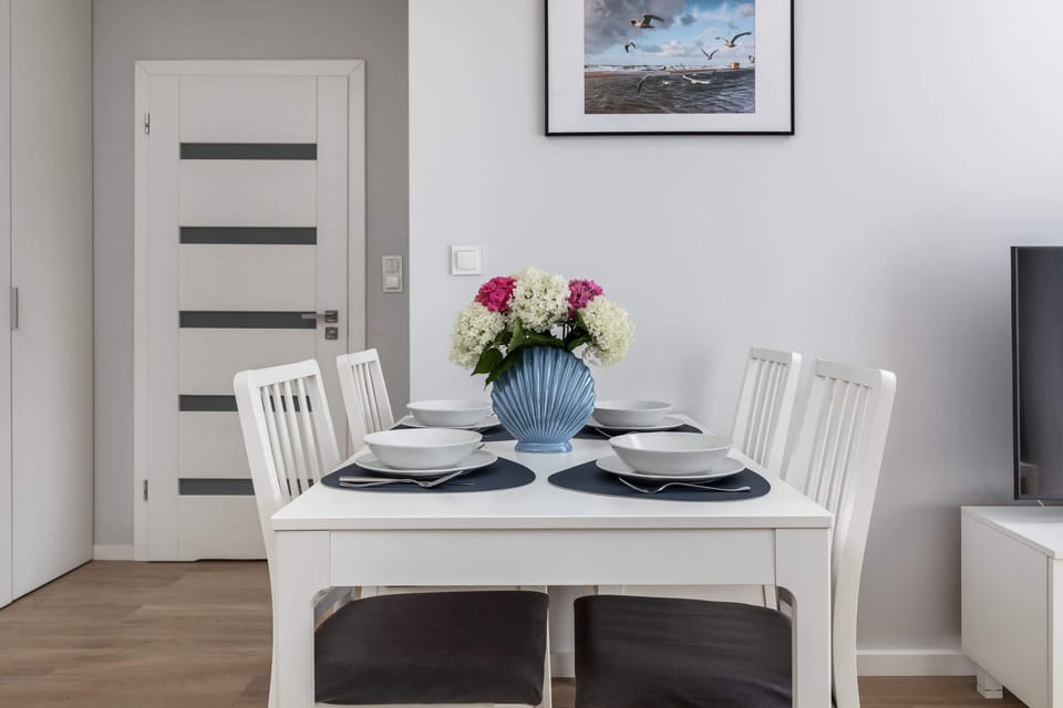 The living room's sleek design is both functional and aesthetically pleasing.