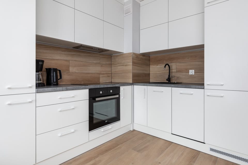 The fully equipped kitchenette includes everything you need for a home-cooked meal.