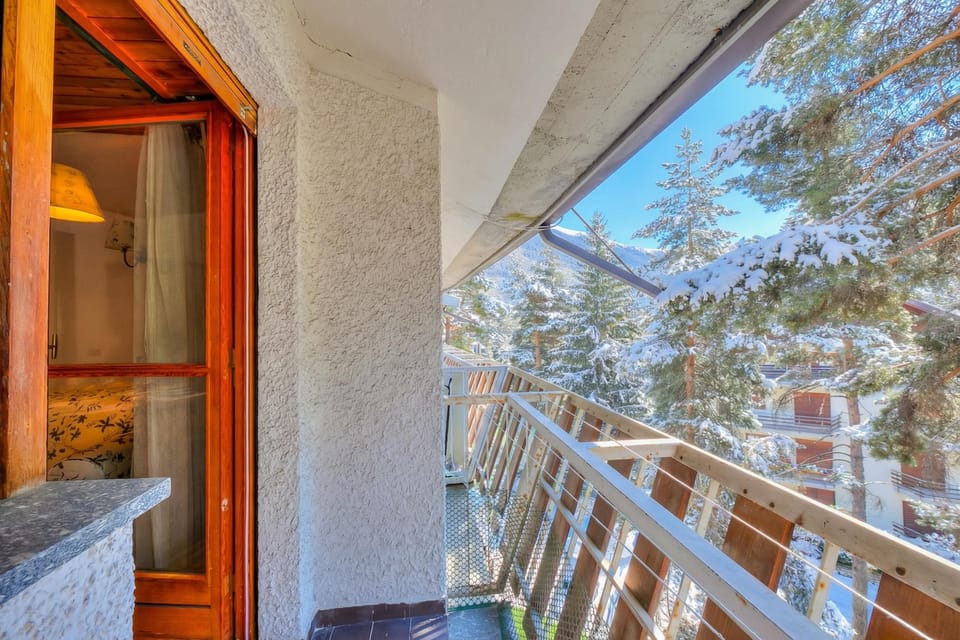 Family Apartment, Multiple Bedrooms (La Tana dello Scoiattolo (Skiing) | Balcony