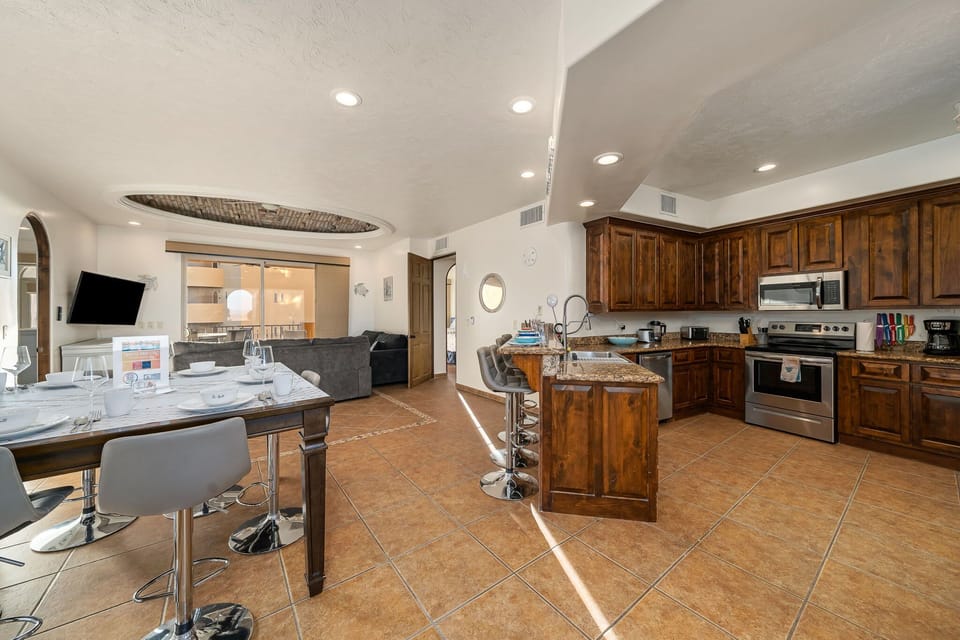 Open kitchen and dining layout- cook, entertain, and gather with everything you need right at your fingertips