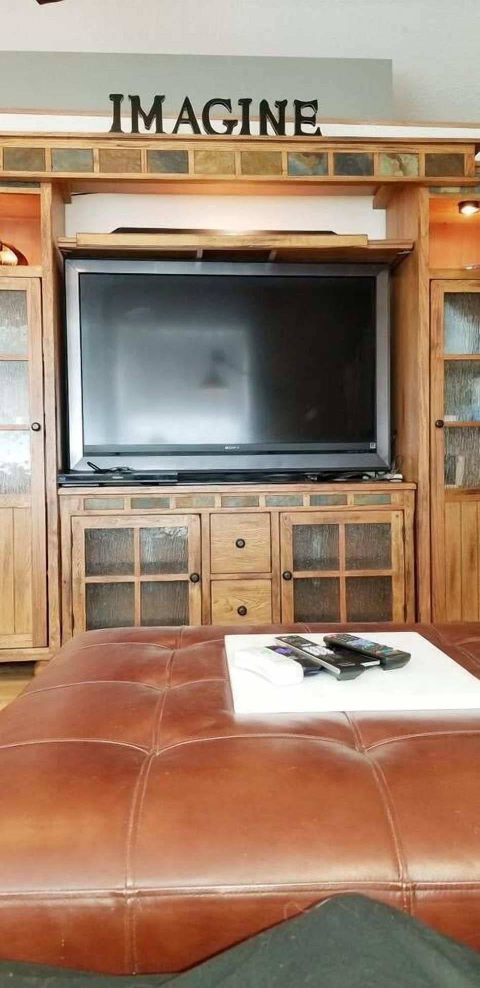 Includes Large LCD TV w/ Roku SmartTV options. Enjoy my HULU, Netflixs, & Sirius Apps. *TV does take a few minutes to warm up but it is 100% nicer than the LG SmartTV I bought to replace it. Was 3K at Costco a few years ago. New Bluetooth Sound Bar.