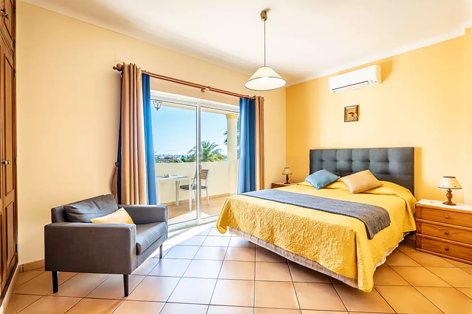 Double bedroom with queen size double bed & balcony right from your bedroom
