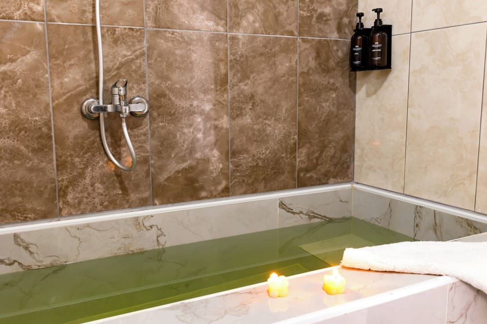 Standart Suit Room | Bathroom | Designer toiletries, hair dryer, slippers, heated floors