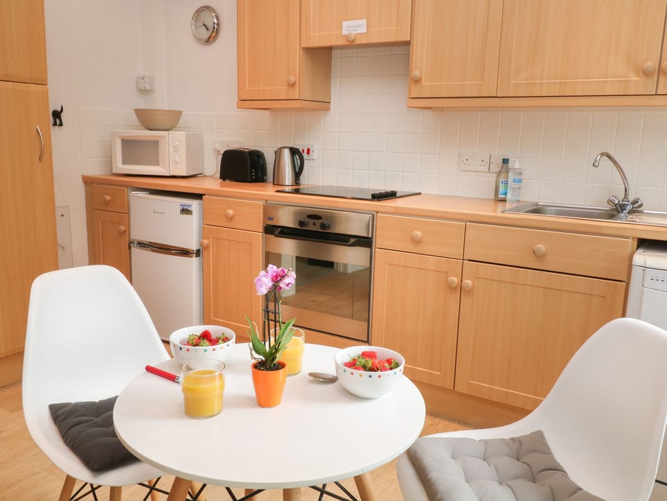 Fridge, electric kettle, toaster, cookware/dishes/utensils