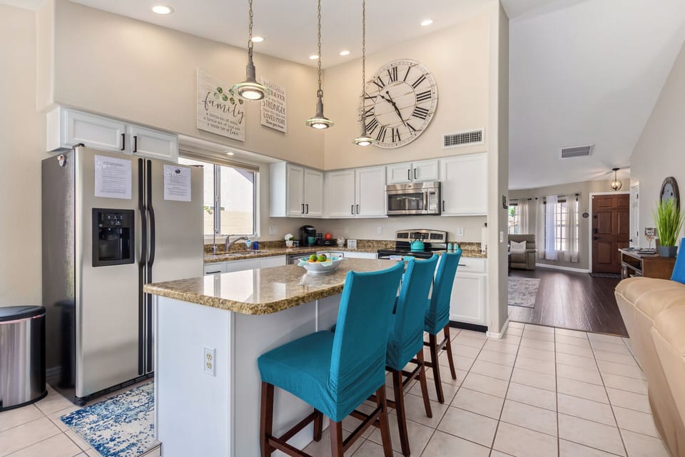 Kitchen is well stocked and includes ample counterspace for food preps.