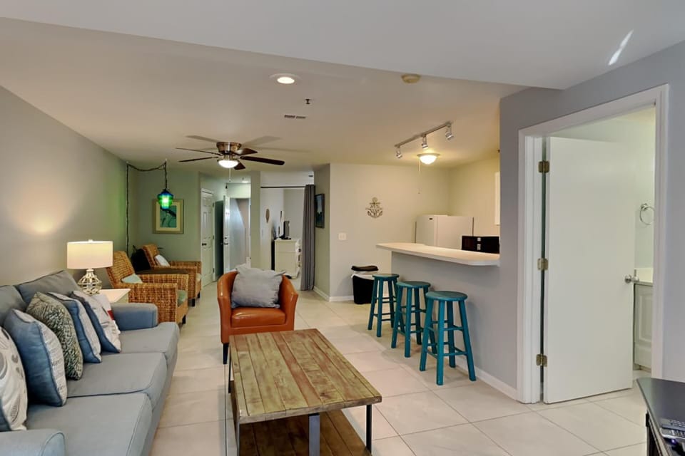 Condo, Multiple Beds, Balcony, Ocean View | Living area | TV