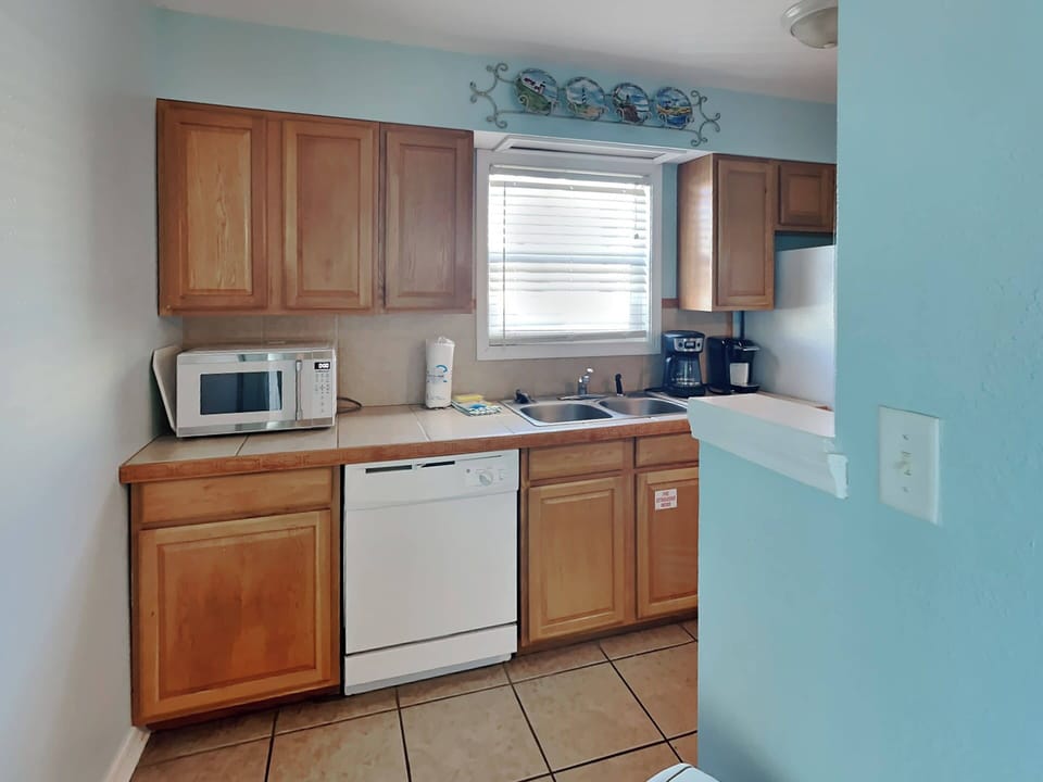 Condo, Multiple Beds, Balcony, Ocean View | Private kitchen | Fridge, microwave, oven, stovetop