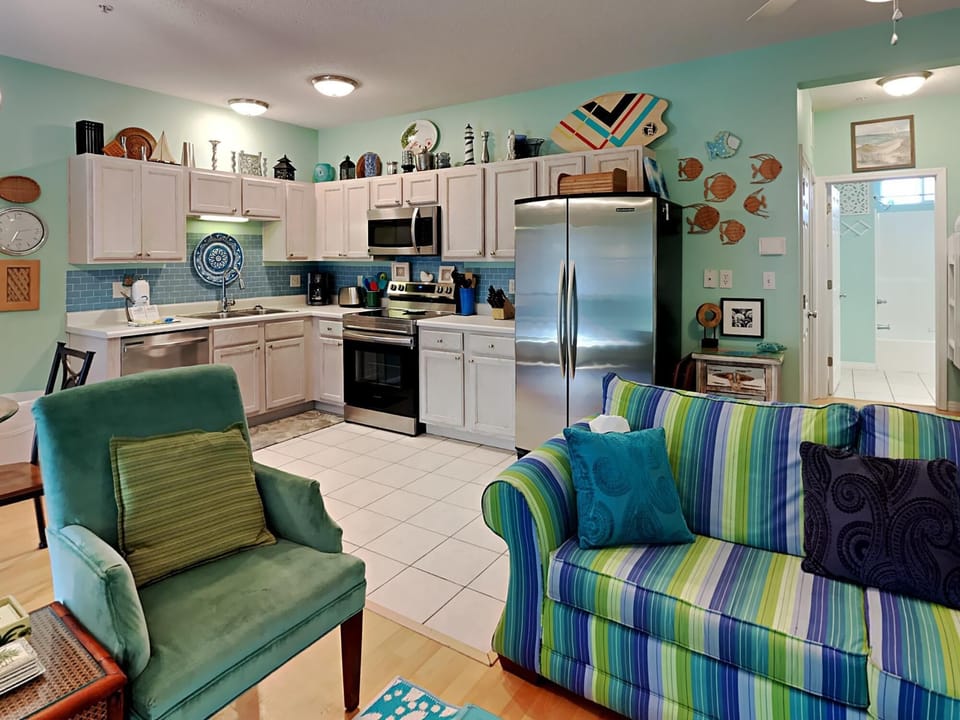 Condo, Multiple Beds, Balcony | Living area | TV