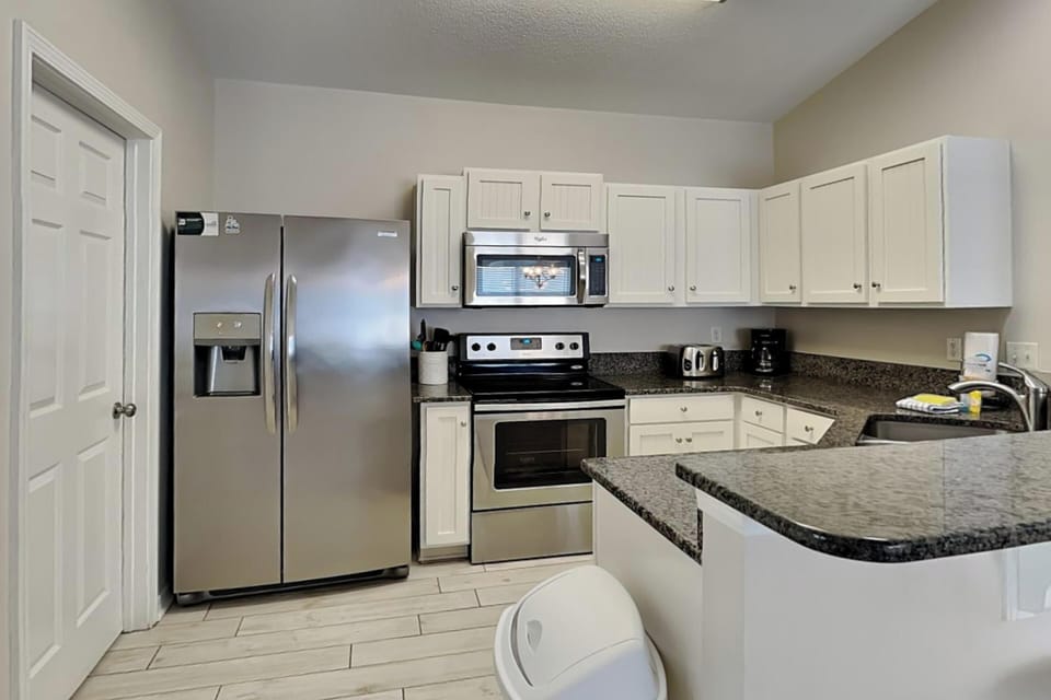 Studio, Multiple Beds, Kitchen, Garden View | Property amenity