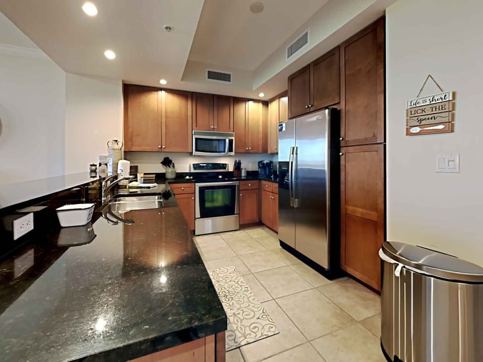 Condo, Multiple Beds, Balcony, Garden View | Private kitchen | Fridge, microwave, oven, stovetop