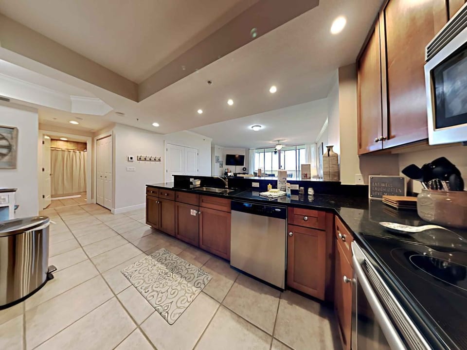 Condo, Multiple Beds, Balcony, Garden View | Private kitchen | Fridge, microwave, oven, stovetop