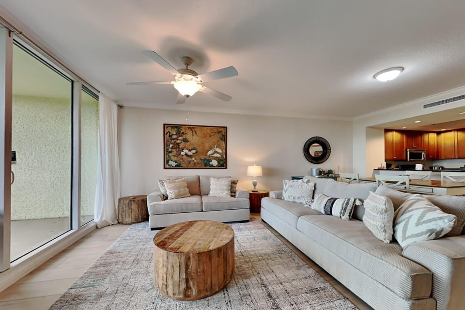 Condo, Multiple Beds, Balcony, Garden View | Living area | TV