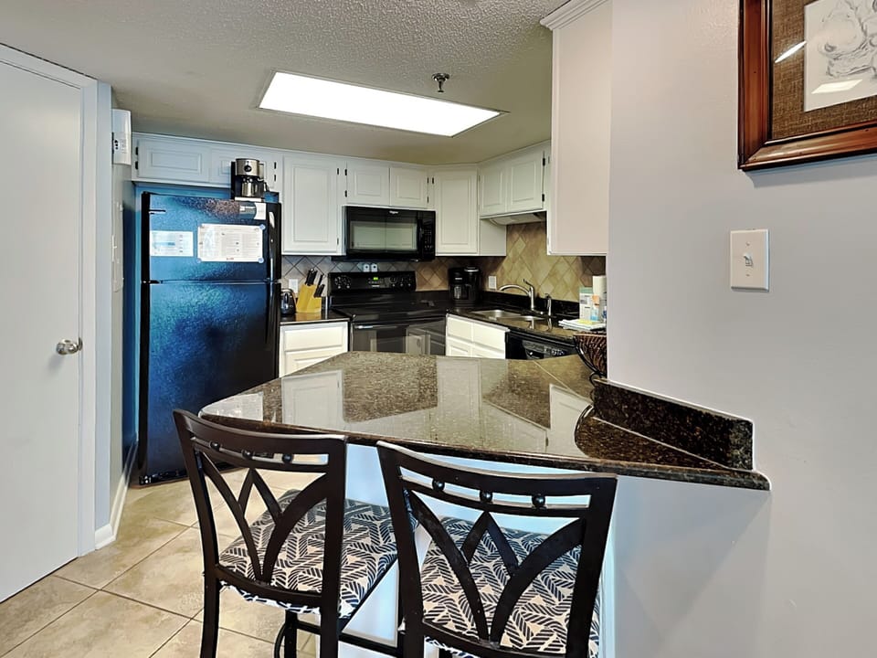 Condo, Multiple Beds, Balcony, Ocean View | Private kitchen | Fridge, microwave, oven, stovetop