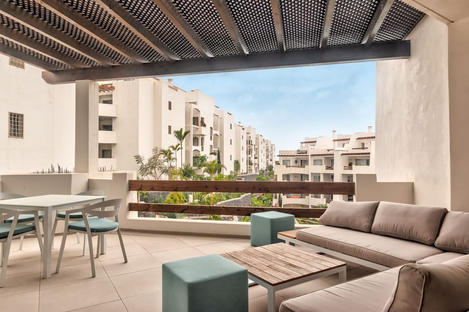Large terrace with chill out area and dining table