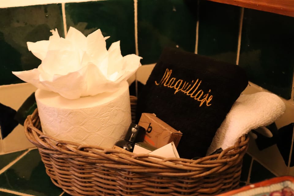 Deluxe Studio Suite (Cadbury) | Bathroom | Shower, hair dryer, slippers, towels