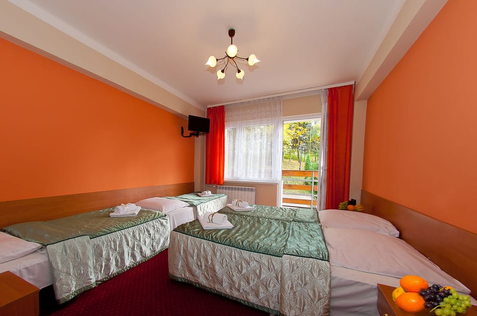Quadruple Room, Balcony | Desk, iron/ironing board (on request), cribs (surcharge), WiFi (free)