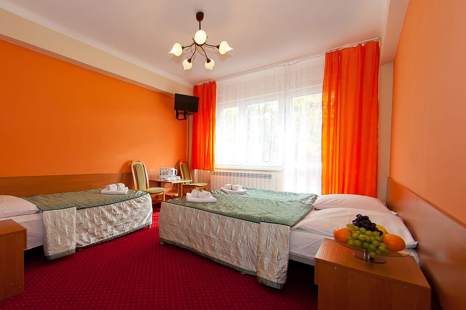 Triple Room, Balcony | Desk, iron/ironing board (on request), cribs (surcharge), WiFi (free)